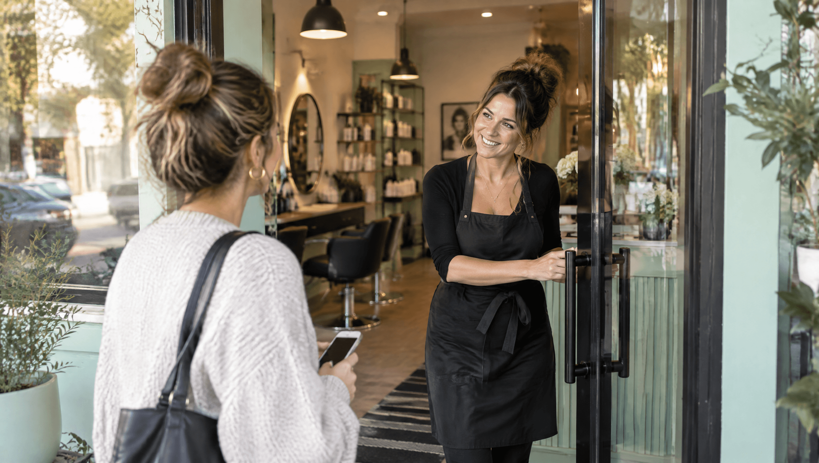 Salon owner opening the door in the morning